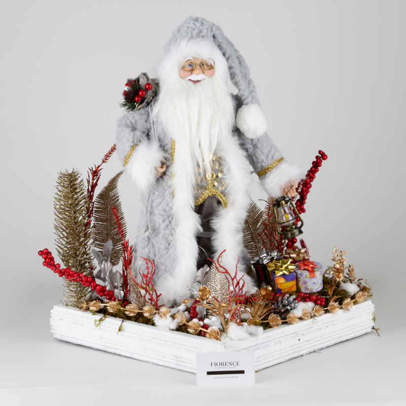 Arreglo navideño con figura de Santa Claus y luces LED