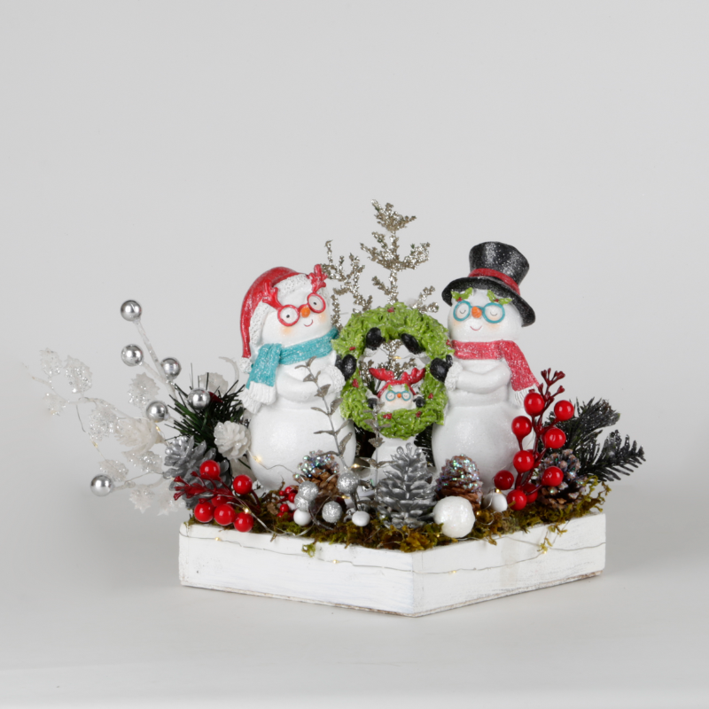 Arreglo navideño familiar de muñecos de nieve