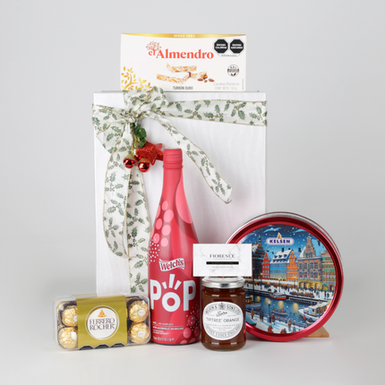 Caja Gourmet con Jugo Espumoso, Mermelada de Naranja y delicias premium.