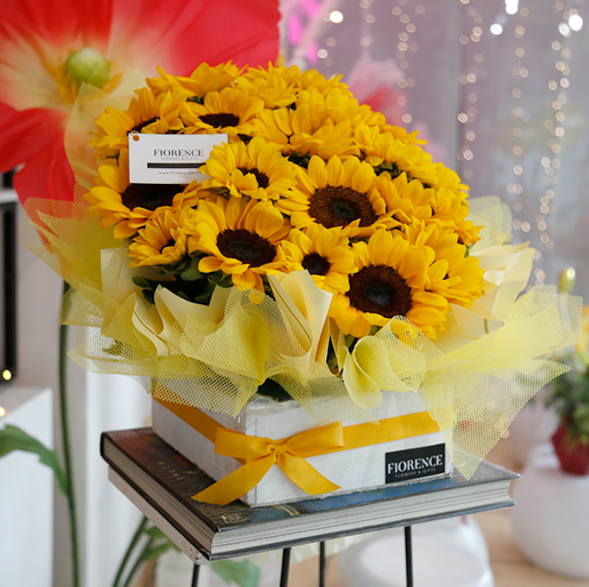 Allegra arrangement with sunflowers