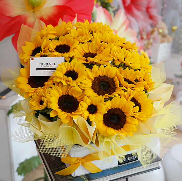 Allegra arrangement with sunflowers