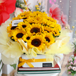 Allegra arrangement with sunflowers