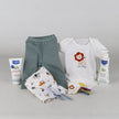 Gift for baby girl or boy featuring Mustela products, clothing, and accessories.