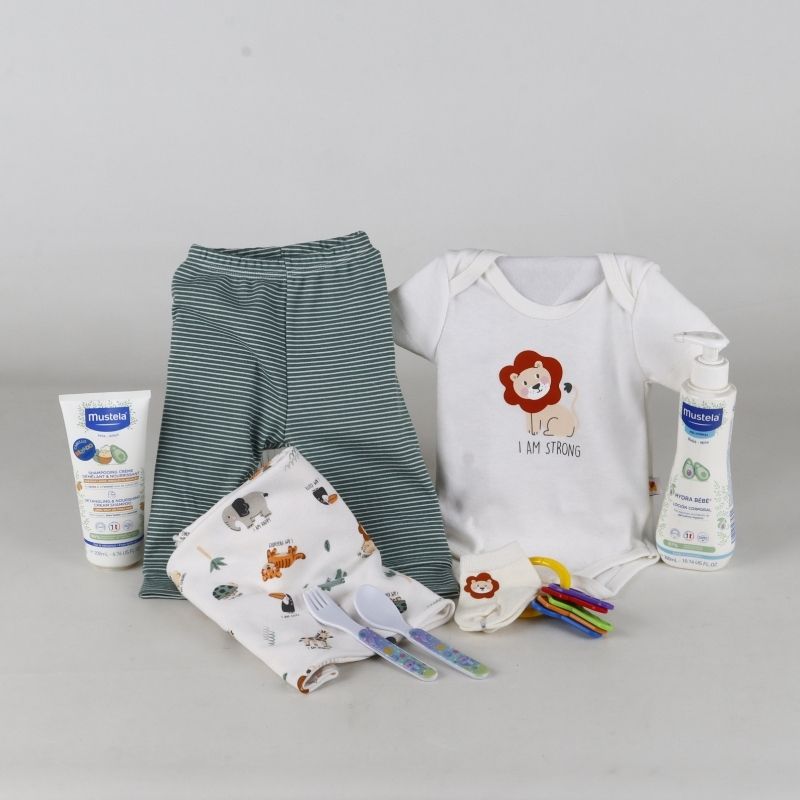 Gift for baby girl or boy featuring Mustela products, clothing, and accessories.