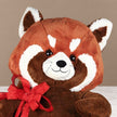Regalo con peluche de panda rojo y chocolates Ferrero Rocher